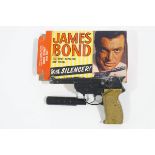 A mid 1960's 'Lone Star' James Bond 100 Shot repeater cap pistol,