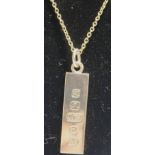 A 9 carat gold ingot pendant, London 1976, on chain, stamped '9ct' to the bolt ring,