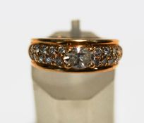 A diamond set dress ring, stamped 'Boucheron', 'B353' over '17716' and a makers mark,