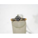 An early 20th century gold and diamond solitaire ring, the old-cut stone approximately 0.