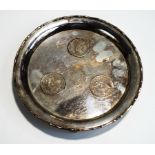 A Chinese coin set salver, stamped 'Wai Kee', Sterling Silver' and 'Made in Hong Kong',