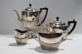 A composite Victorian silver four piece tea and coffee set,