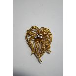 An 18 carat gold diamond set brooch, Birmingham import marks for 1969,