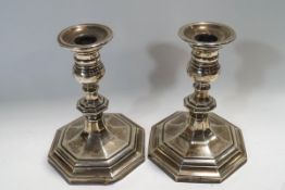 A pair of silver candlesticks, by Mappin & Webb, Sheffield 1949,