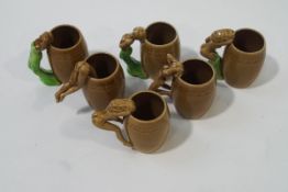 A set of six Continental mugs,