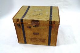 A large vintage canvas and leather bound trunk,