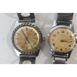 Two gentleman's 1950's stainless steel bracelet watches, one the dial marked Poljot,