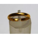 A 22 carat gold wedding ring,