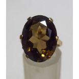 A 9ct gold single stone smokey quartz dress ring, finger size N1/2, 6.