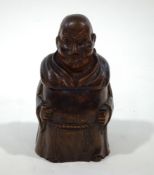 A carved wooden tobacco box and cover, in the form of a Friar,