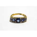 An 18 carat gold five stone sapphire ring,