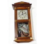 An early 20th century oak cased wall clock, with square silvered dial,