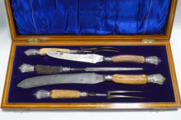 A five piece antler and silver mounted carving set,
