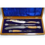 A five piece antler and silver mounted carving set,