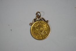An 1897 American 5 dollar coin, with a soldered scroll pendant mount,