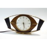 A retro electric clock by Metamec,