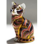 A Royal Crown Derby seated cat paperweight, with gold coloured stopper, 13.