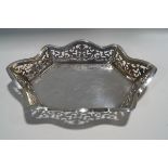 A silver pierced bread basket, by E.