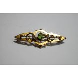 An Edwardian green paste and simulated pearl brooch,