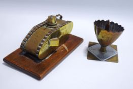 Two items of First World War trench art: a tank inscribed Arras-Ypres 1919,