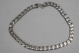 A heavy silver chain, of filed curb links, 57 cm long, 154 g (4.