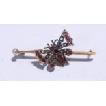A late Victorian rose diamond and ruby butterfly bar brooch,