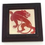 A William de Morgan pottery tile, decorated in ruby lustre with a mythical beast on a cream ground,