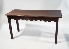 A 19th century rectangular mahogany side table, with shaped frieze and square legs, 76.