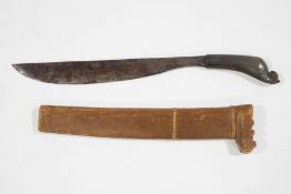A Malay Golok jungle knife with carved horn handle, blade 35cm long,