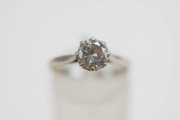 A single stone diamond ring, the white mount unmarked,