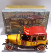A Dinky Supertoys clockwork tin plate car, in box,