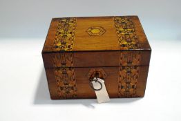 A Victorian inlaid mahogany sewing box, with interior compartments, 20cm wide,
