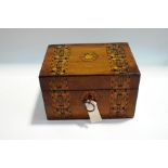 A Victorian inlaid mahogany sewing box, with interior compartments, 20cm wide,