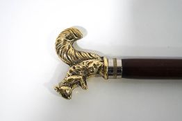 A walking stick with gilt metal squirrel knop