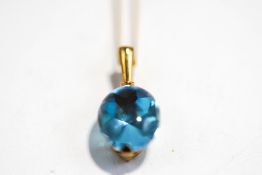A pendant, the mixed cut cabochon stone to a mount stamped '9k', 2 cm long,