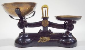 A set of brass and black enamel scales retailed by Boots