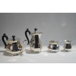 A four piece silver tea service, by Roberts & Belk, Sheffield 1978, of octagonal baluster shape, 1,