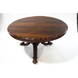 A Victorian rosewood circular tilt top breakfast table,