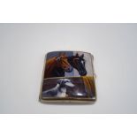 A silver plated enamelled cigarette case, the cover with two horses and a dog, 8.6 cm x 7.