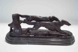 After Barye, Running Borzoi, spelter on a marble base, 12cm high, 33cm wide,