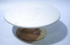 A 1970's white fibreglass low coffee table;