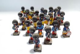 Twenty three Robertson's Jam painted plaster figures of Golly, some with labels,