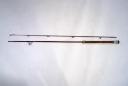 A Sharpes ' The Scotia' spinning rod in makers bag