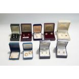 A collection of nine pairs of earrings, most stamped for 9 carat gold and most are stone set,