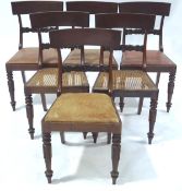 A set of six Victorian mahogany dining chairs with rail backs and carved horizontal splats,