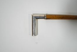 A Malacca cane with white metal handle