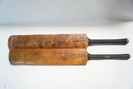 Two vintage cricket bats, one by Gunn & Moore,
