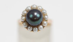 A cultured pearl cluster ring, stamped '14K',