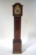 An early 20th century oak cased three train Granddaughter clock, Westminster chimes,