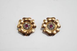 A pair of flowerhead ear clips, unmarked,